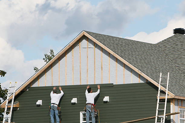 Professional Siding technician working in Rogersville, PA